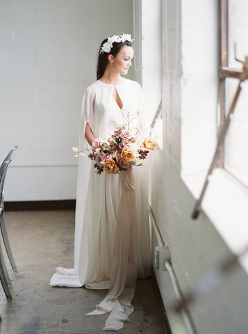 Bride Holding Bouquet with Long Pink Silk Ribbon by The Lesser Bear. Photography Ashley D Florals Old Slate Farm and Design Auburn and Ivory Creative