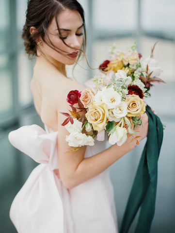 Bride Holding Bouquet with Silk Ribbon from The Lesser Bear, Florals State and Arrow, Photography Jenny Haas and Design Auburn and Ivory Creative