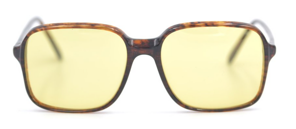 New old stock Luxottica 500 L7 vintage fashion glasses. The frame has been fitted with a yellow fashion tint and the glasses are very similar to that worn by Monique in the Netflix hit The Serpent.