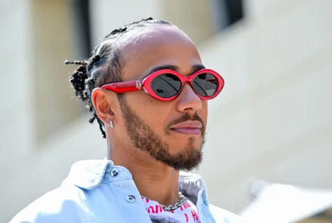 Lewis Hamilton owns Company Producing ApexGP film in red Dior vintage style sunglasses