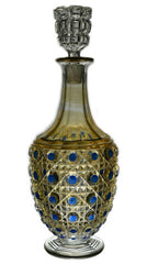 Antique cut glass decanter with blue diamonds