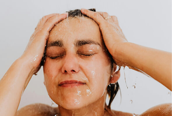 beautiful woman with contacts taking shower