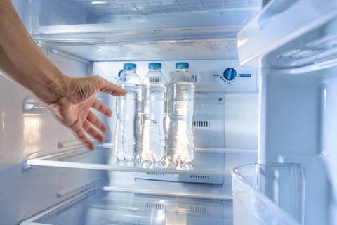 bottled water in fridge