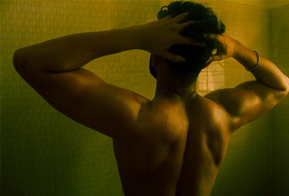 man taking cold shower