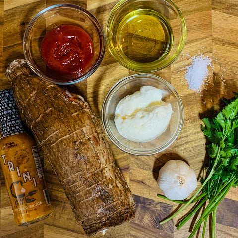 Trini Pepper Sauce, Yuca, Cassava, Avocado oil, mayonnaise, ketchup, Hot Trini Pepper Sauce, Garlic cloves, cilantro, apple cider vinegar, salt, ground cumin