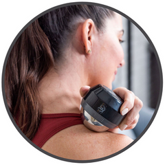 Women using Cryoglide massage ball on shoulder.