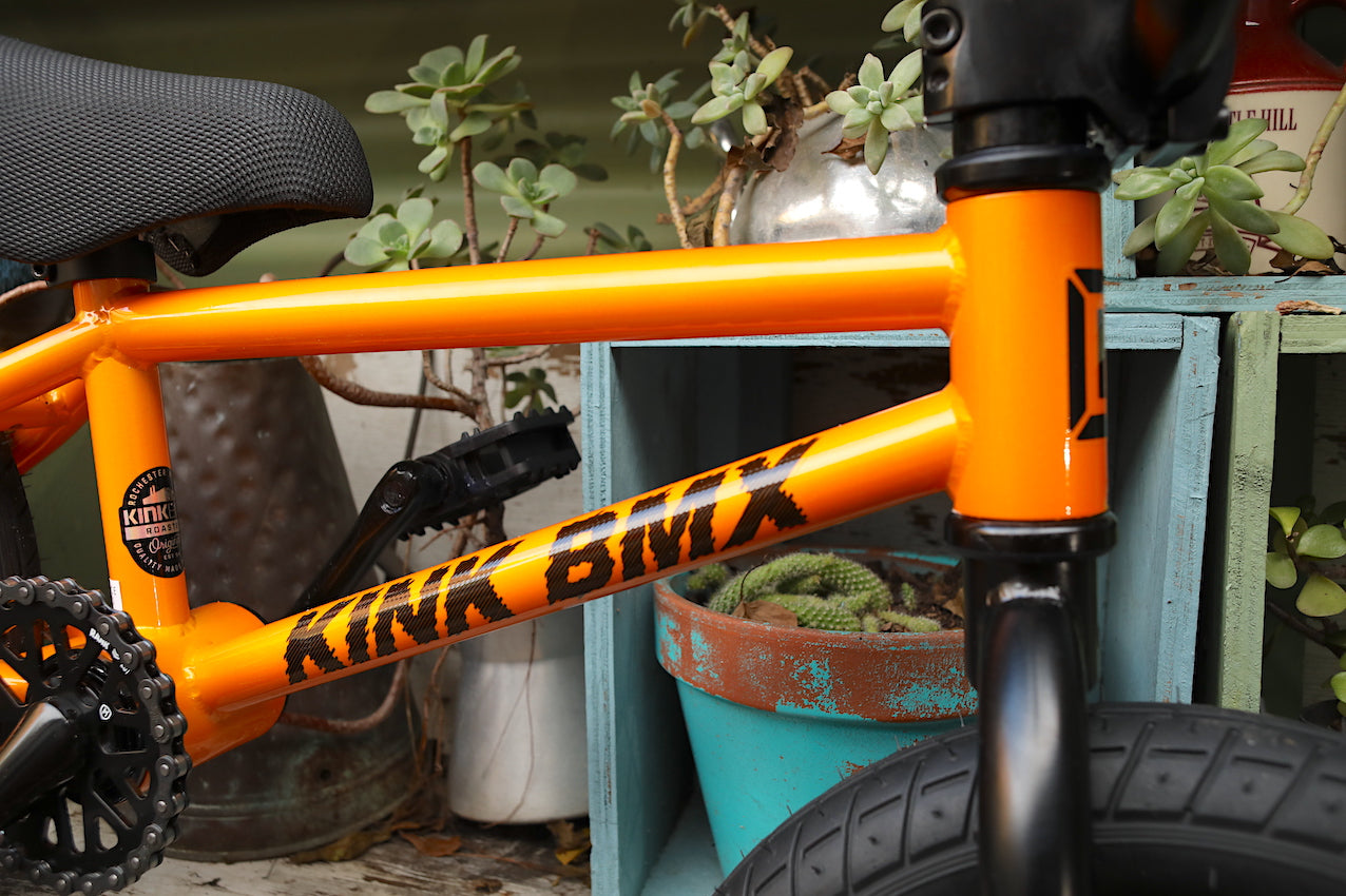 orange 12 inch bike