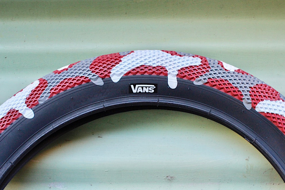 vans red camo tires