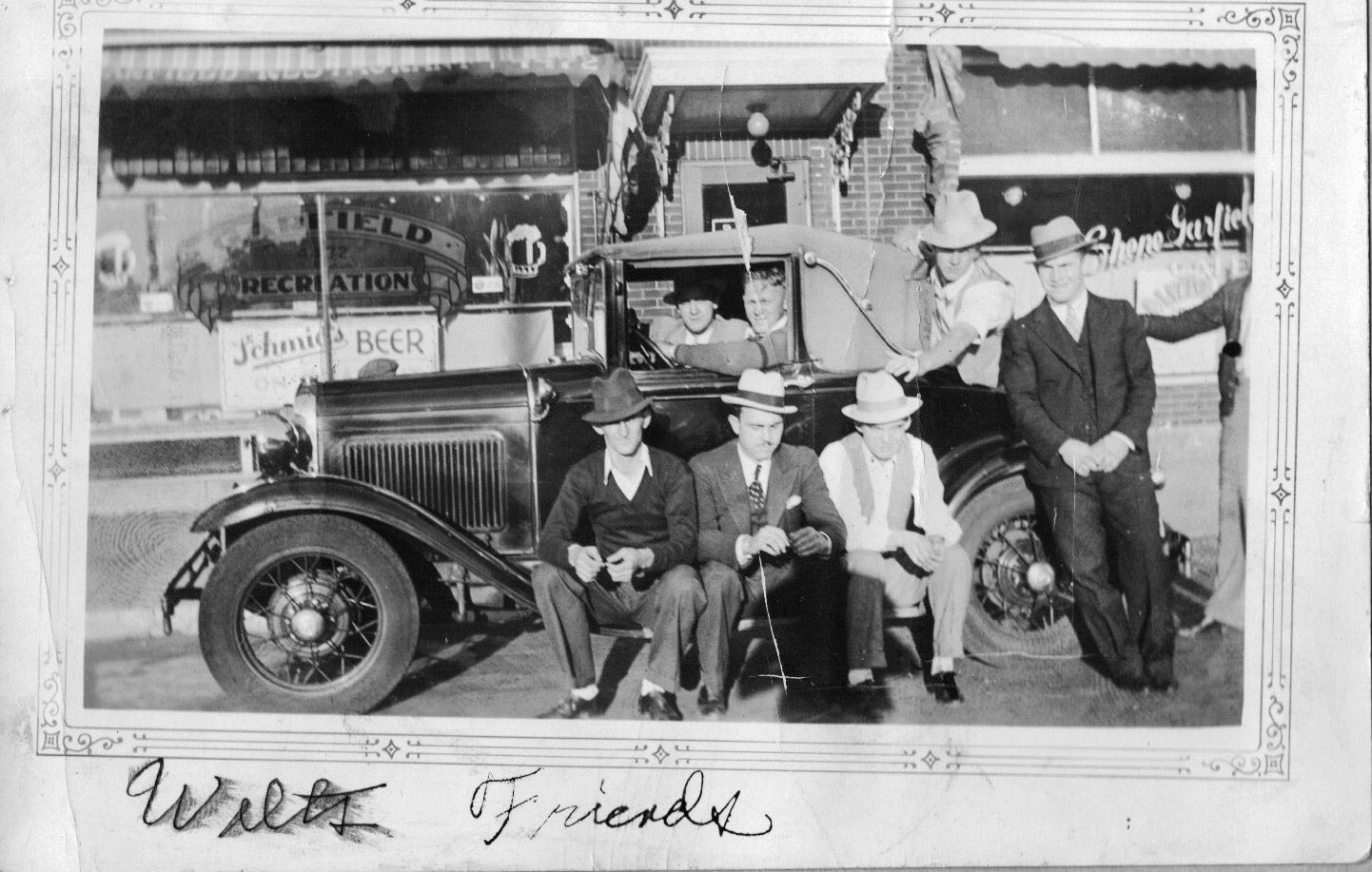 Craig Kwiatkowski’s Uncle Wally Baczkowski and friends pose in front of Garfield Recreation likely around the 1930’s. Garfield Recreation is one of the local businesses included in the recovered promotional table.