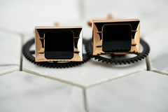 A product image of the rose gold Carre square enamel cufflinks for men by Dear Martian, Brooklyn.