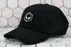 An image of the black distressed Denim Dear Martian Hat, featuring a white embroidered hexagonal logo.