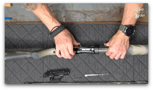 remove cartridge stop interrupter mossberg shotgun