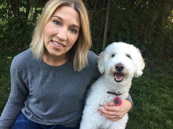 Cassie Fehlen with her dog.Vivant Skin Care interview 