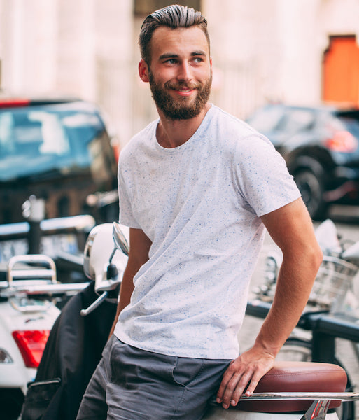 Handsome male model with beard wearing white blank t-shirt 