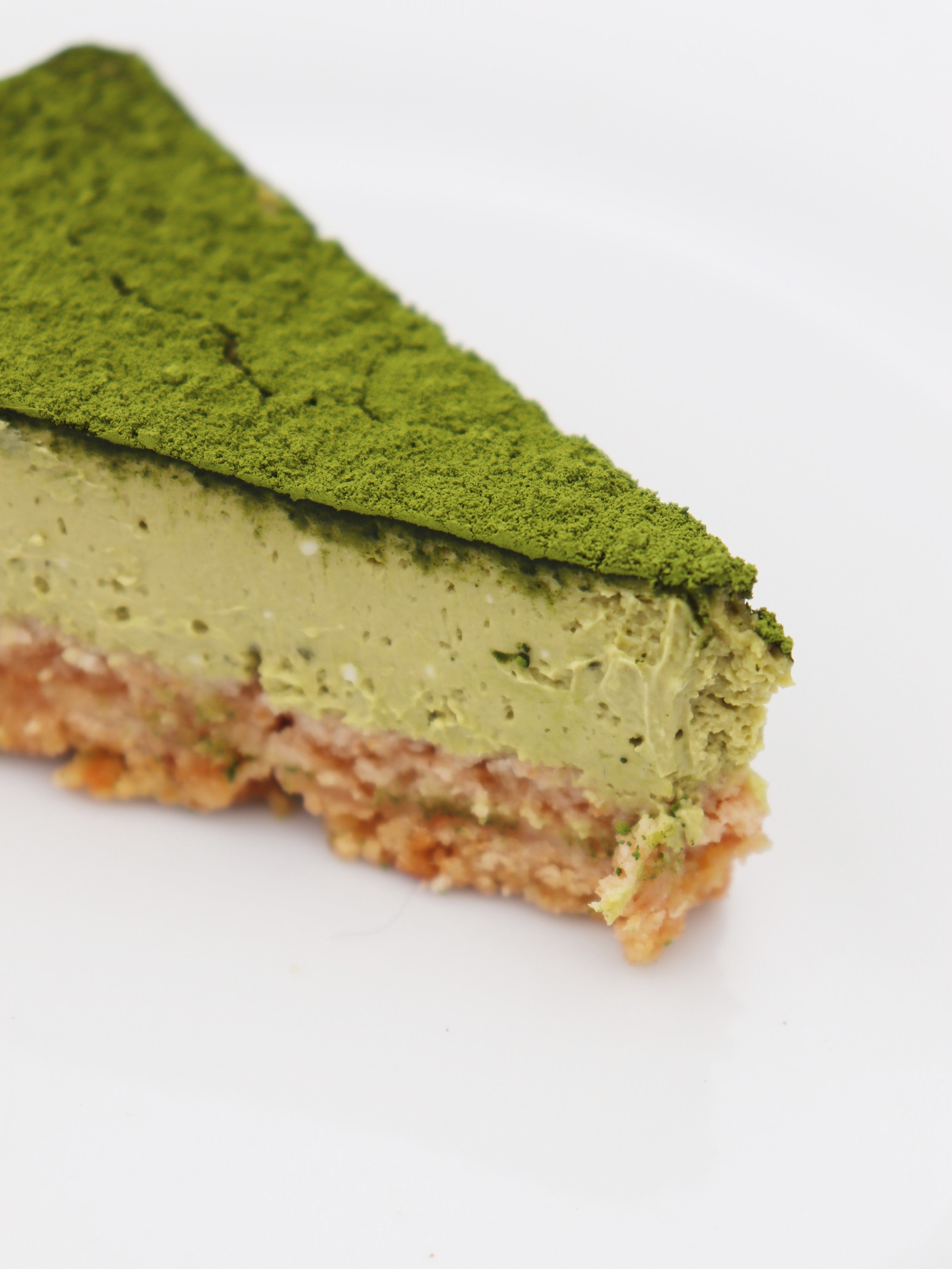 Part de cheesecake au thé matcha ultra-premium bio