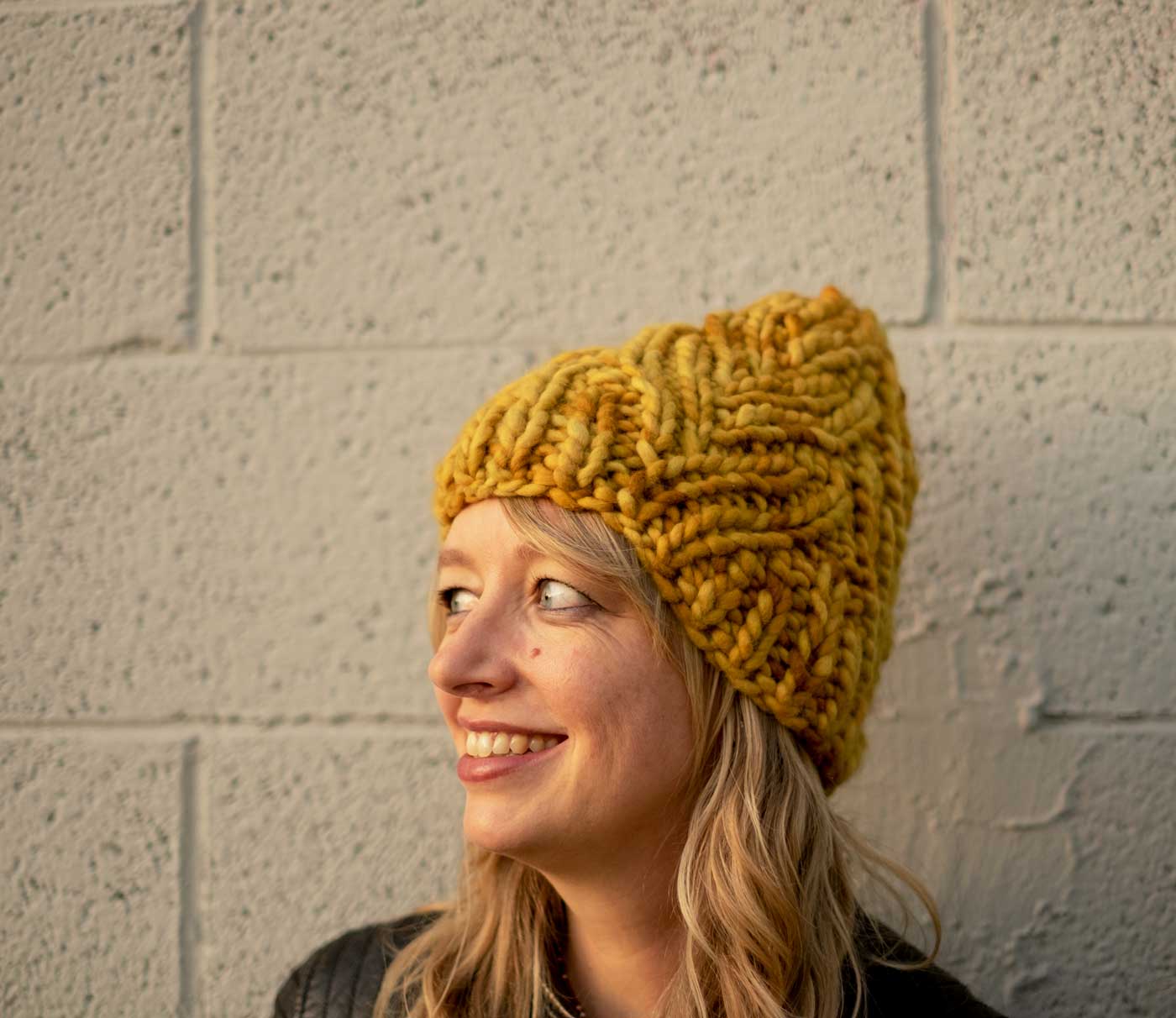 Amber in her mustard Neighborhood Holiday Hat