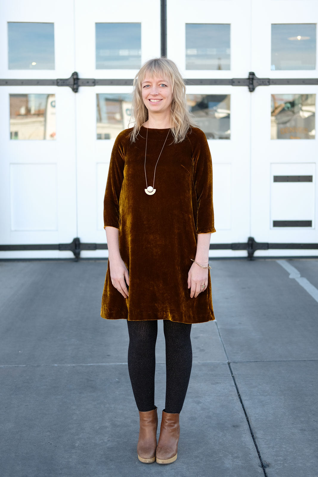 Amber Platzer Corcoran in an Amber Iridescent Velvet Raglan dress