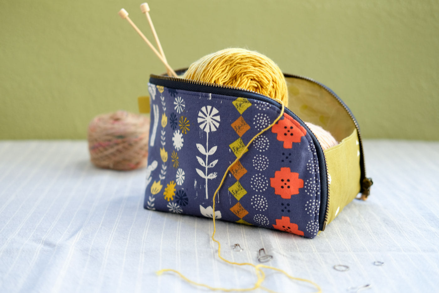 Caitlin Vannoy's Open-Out Box Pouch filled with yarn and knitting notions