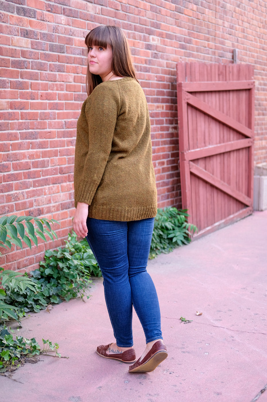 Back View of the Long Fingering Weight Uniform Cardigan
