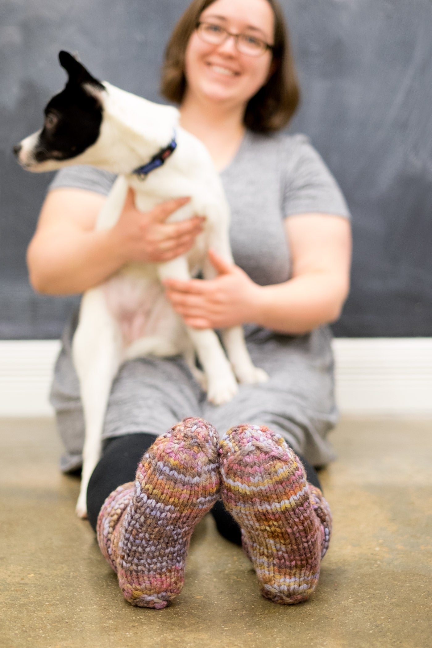 Caitlin in her California Comfortable Slippers holding Arrow