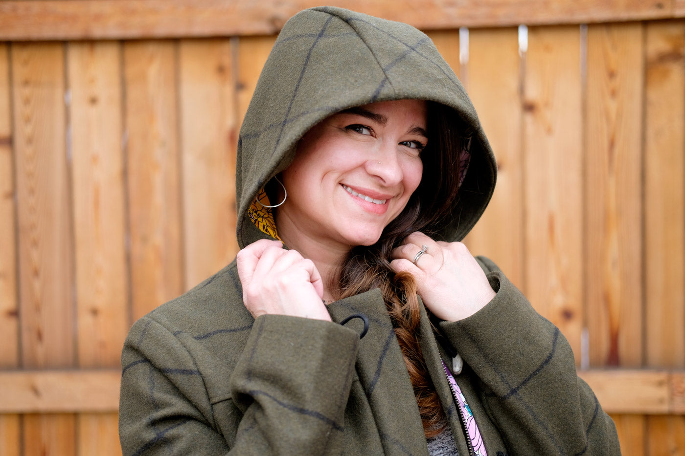 Tiffani wearing the hood of her Cascade Duffle Coat