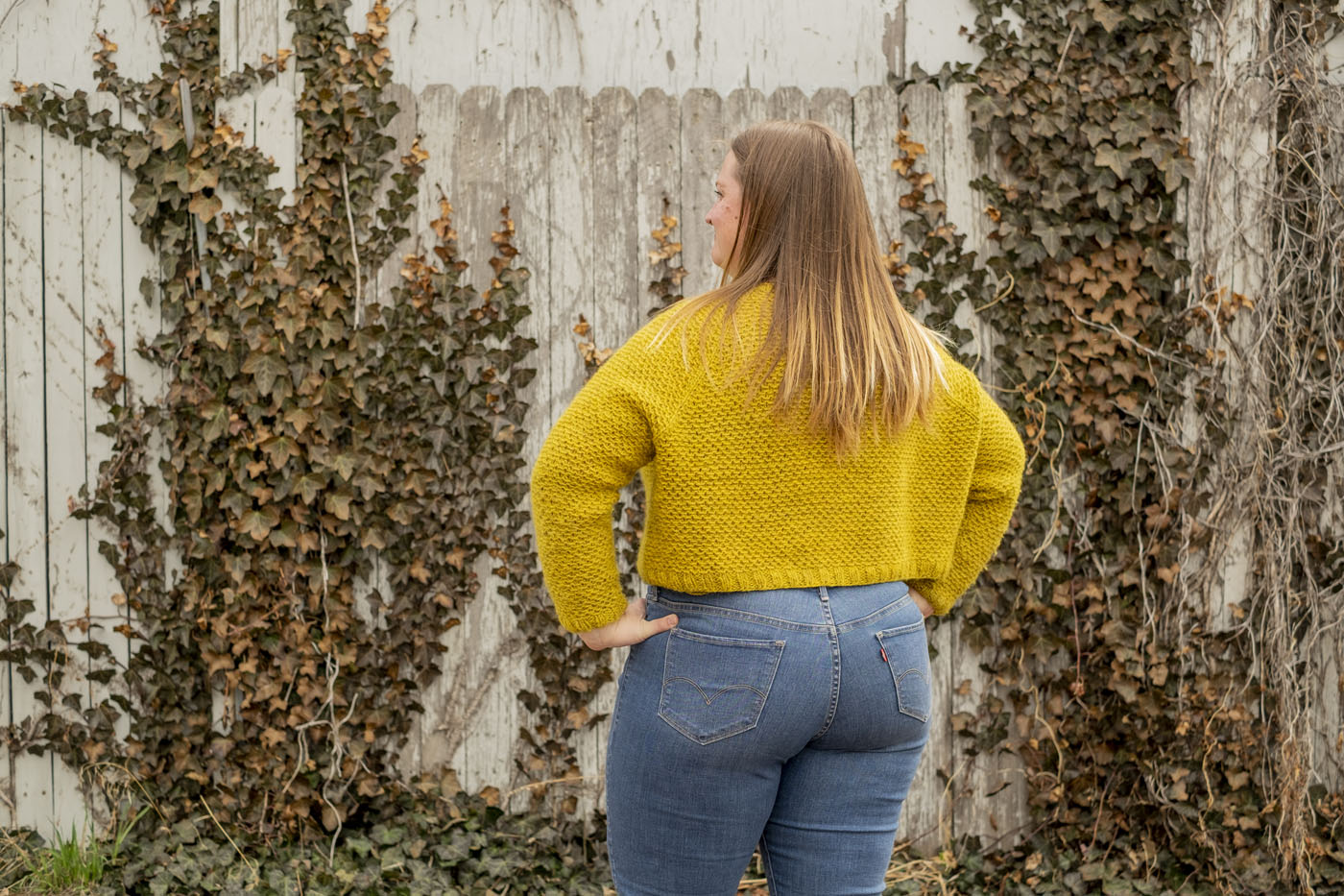 Back view of Shawna's golden nurtured handknit sweater