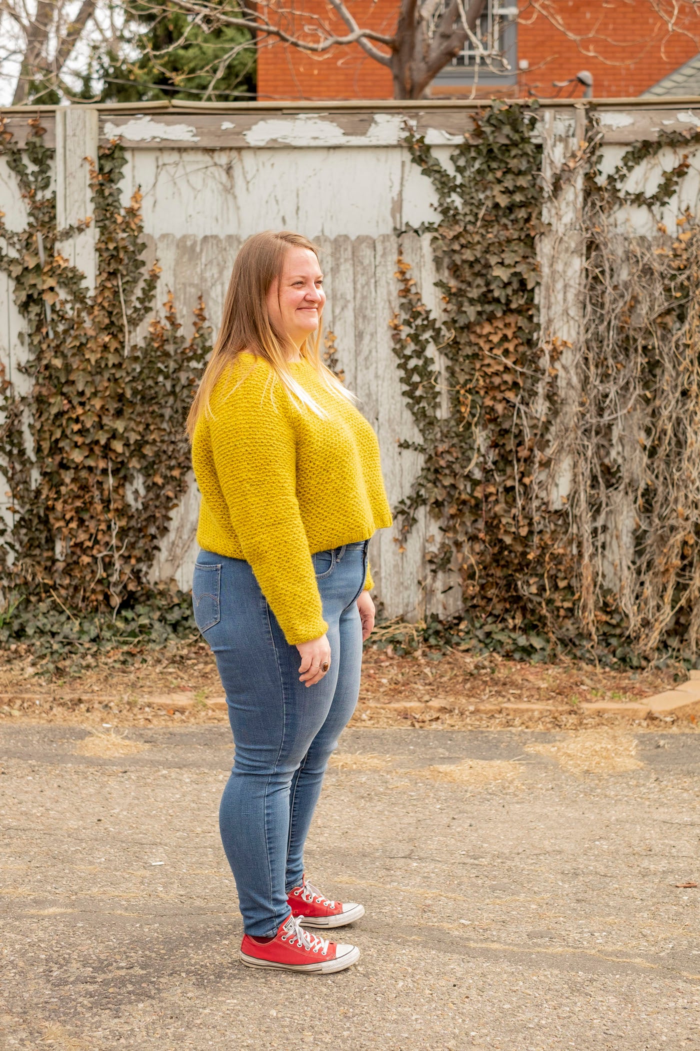 Sideview of Shawna's cropped nurtured sweater