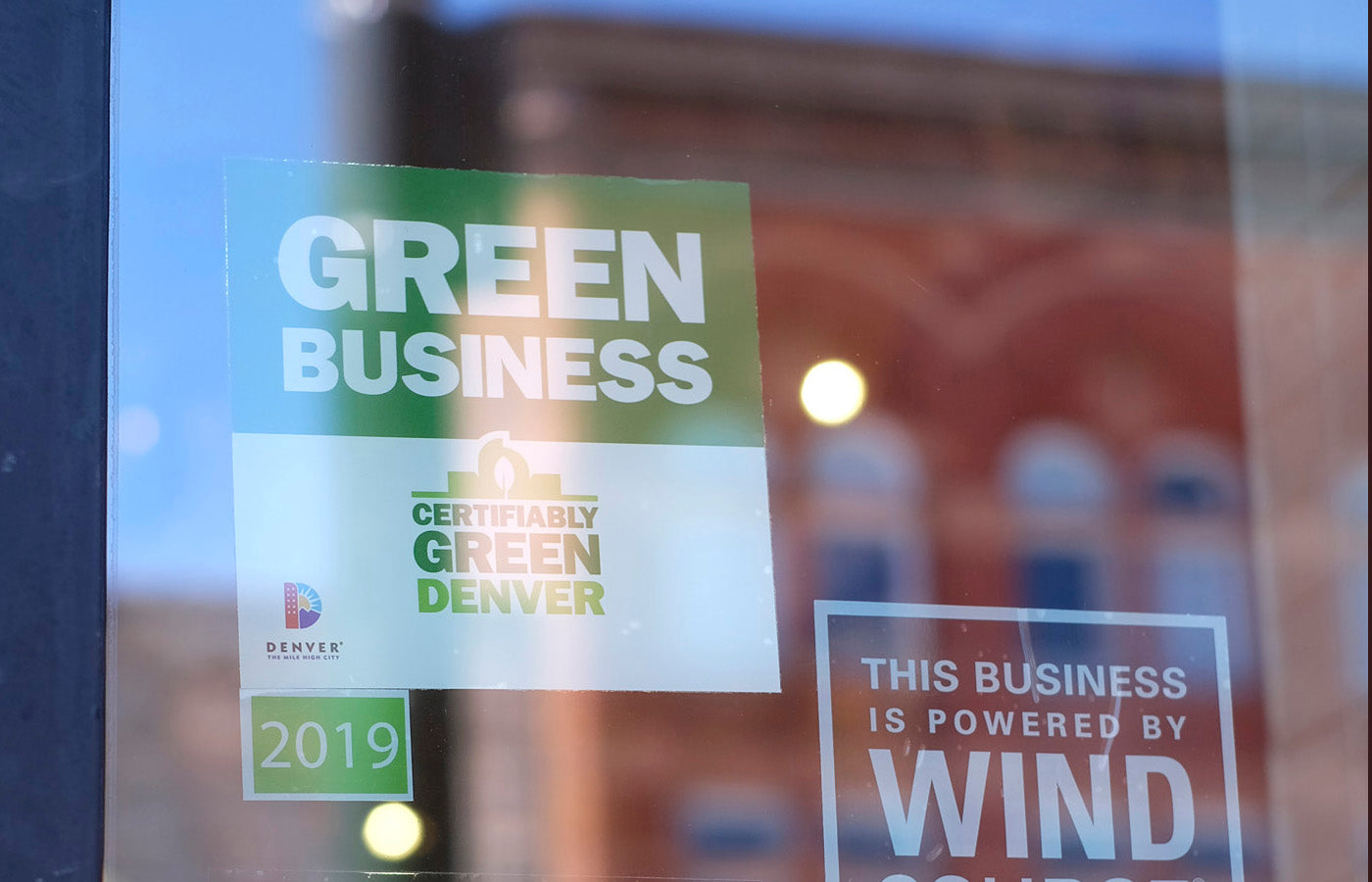 green business decal on store front