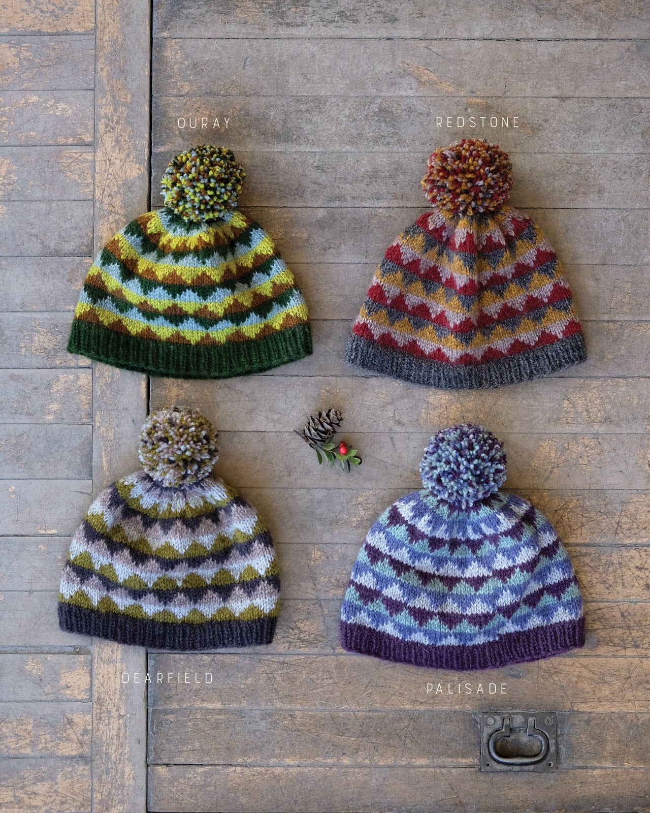 Each of the Eshaness Colorway's knit up in hats