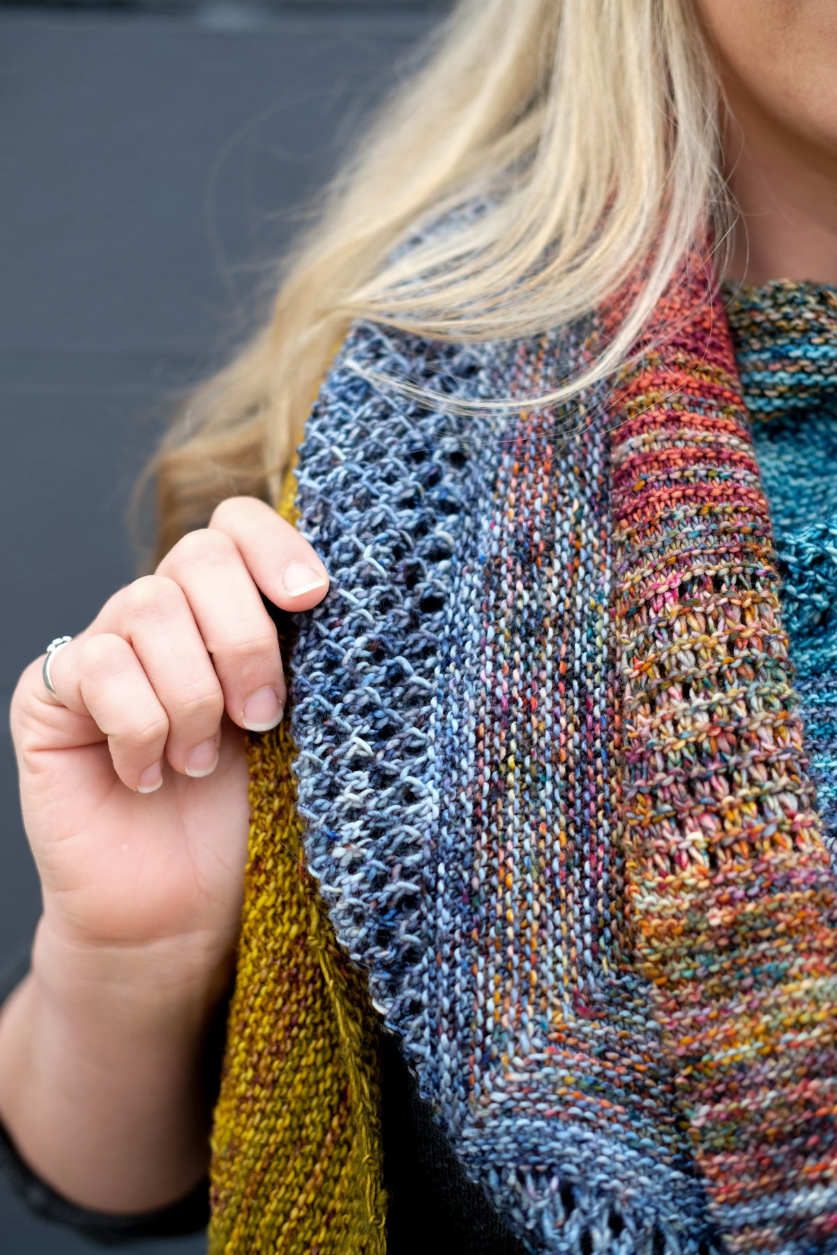 Detail of speckled  Malabrigo Mechita in blue and green tones