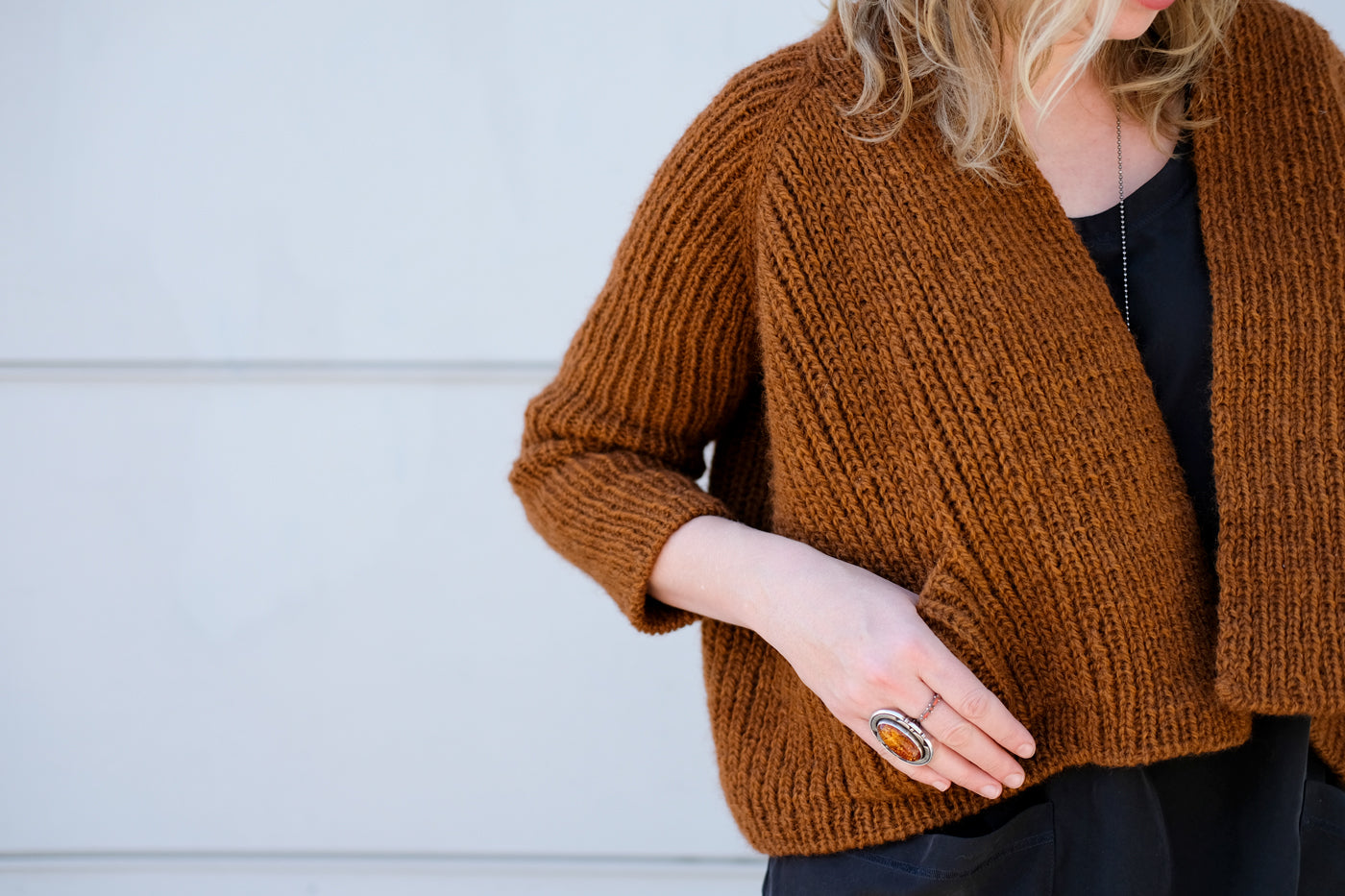 Tiny pocket detail for Amber's cropped sweater