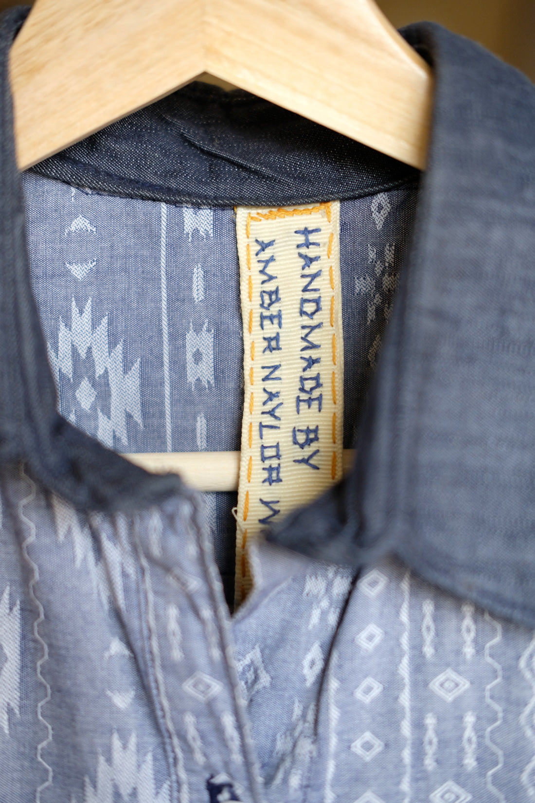 Hand-stitched clothing tag