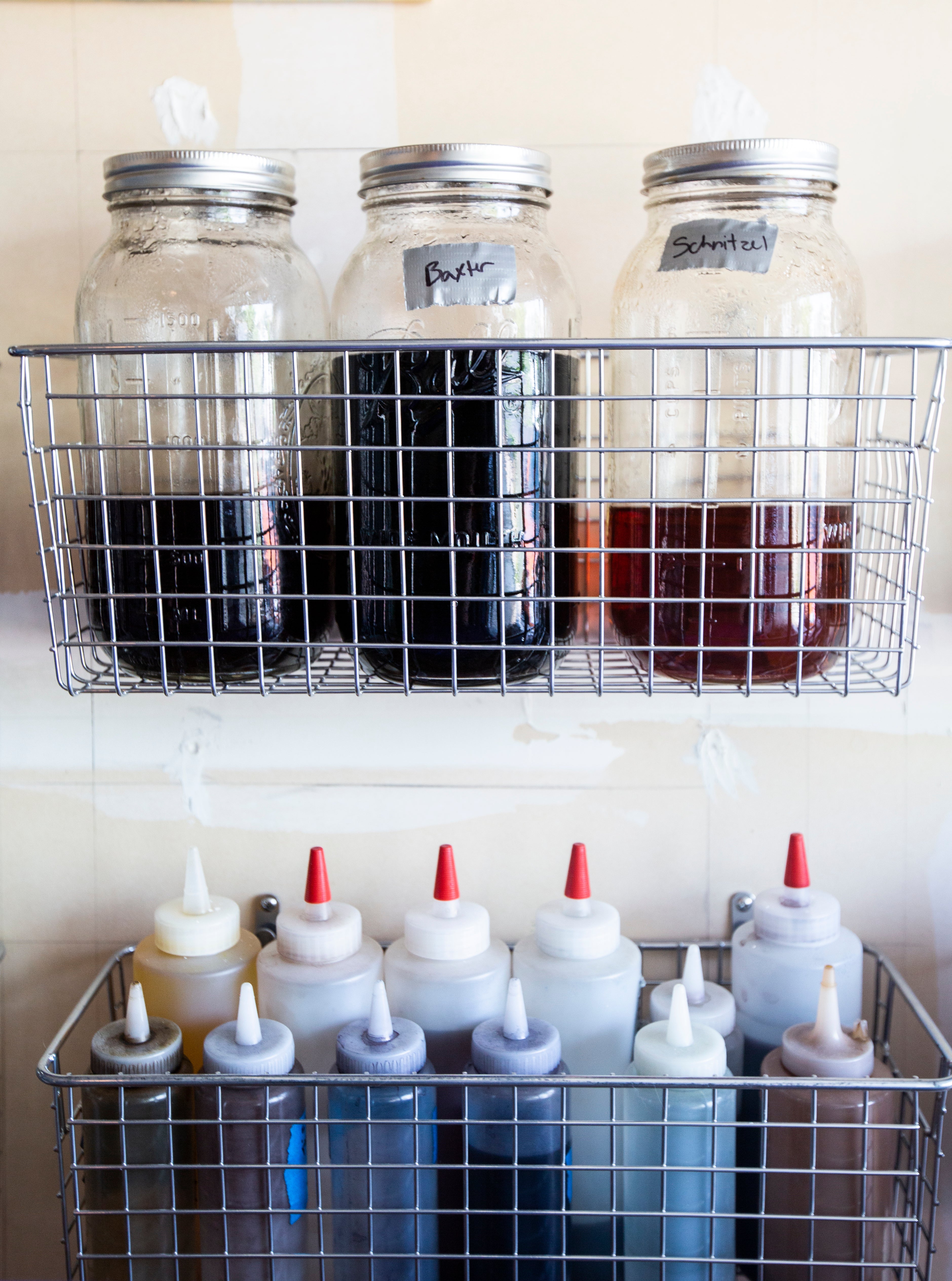 this is an image of dyes on shelves on the wall