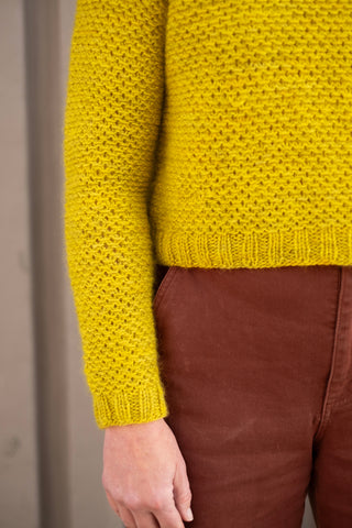 Cuff view of the sweater arm