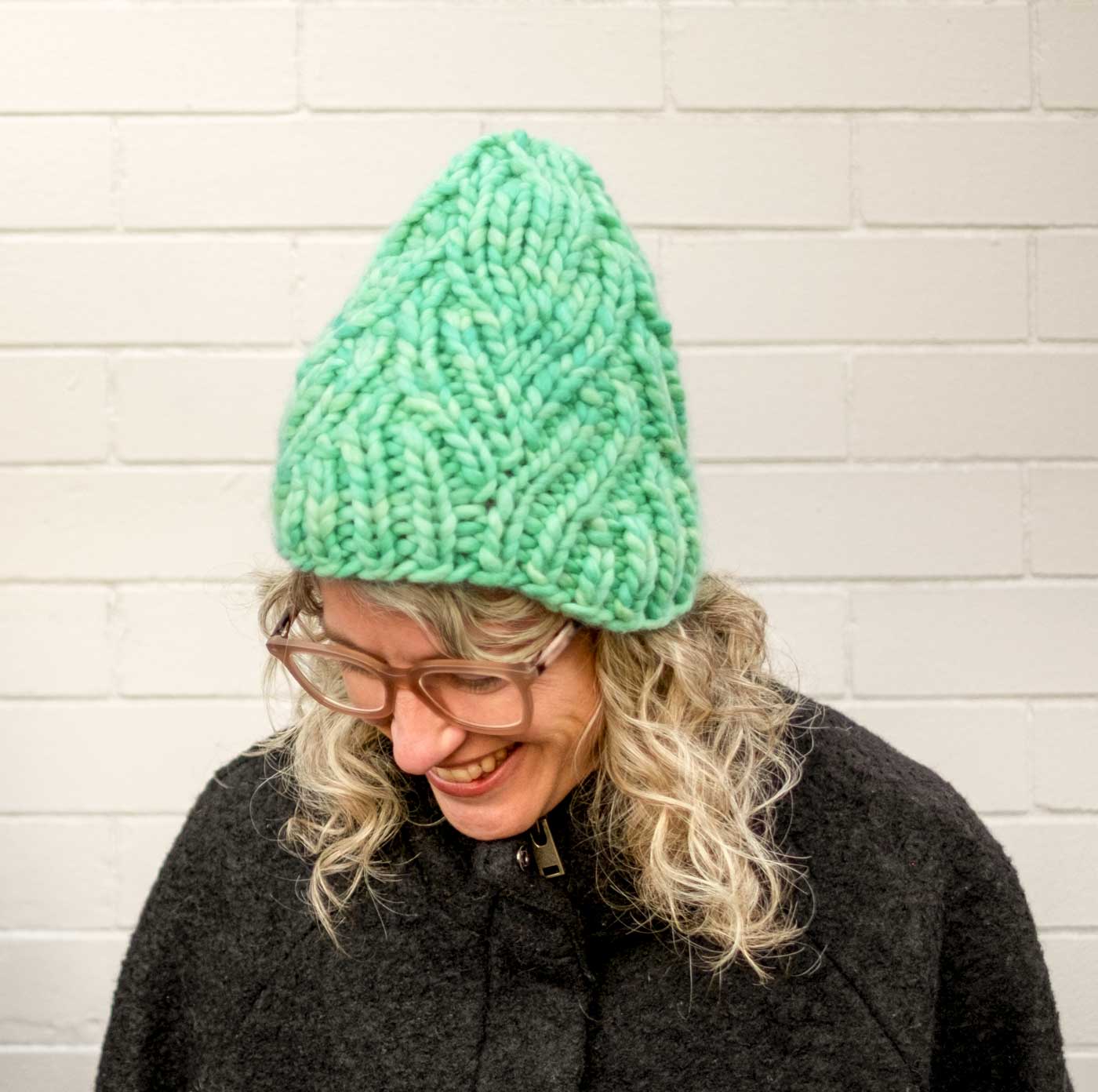 Jaime wearing her mint Neighborhood Holiday Hat