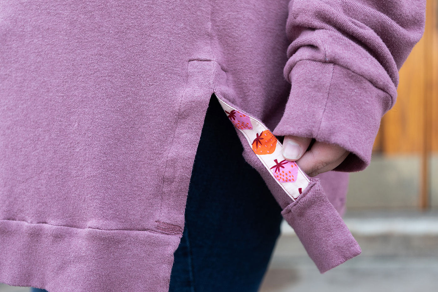 This is an image of a close up of the peekaboo strawberry fabric Kim used as her facing on the side split hem.