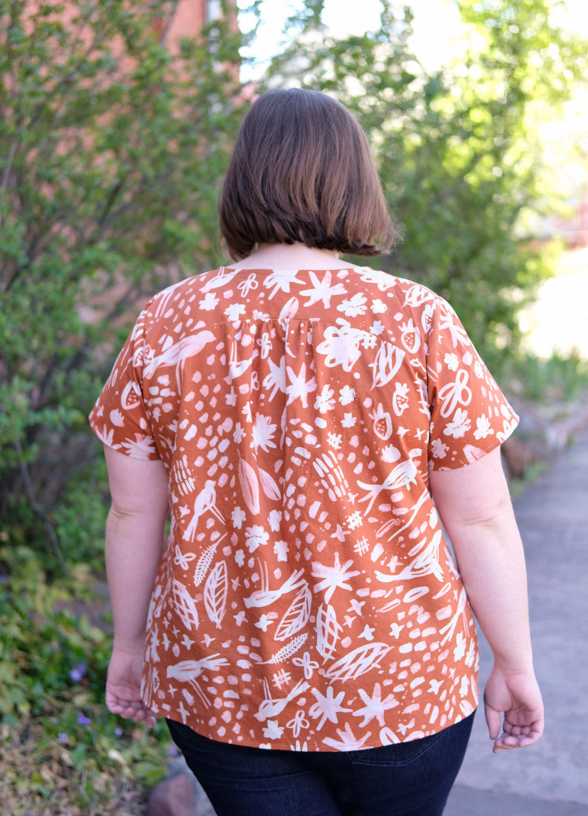 Back view of Caitlin in her burnt orange Montrose