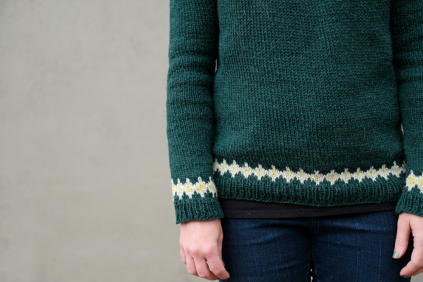 Detail photo of the hemline and cuffs on Jaime's new pullover