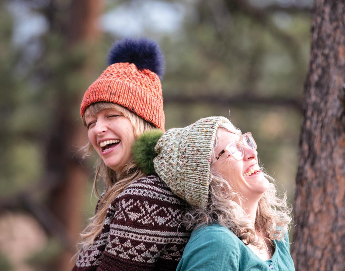 Amber and Jaime laughing in hats