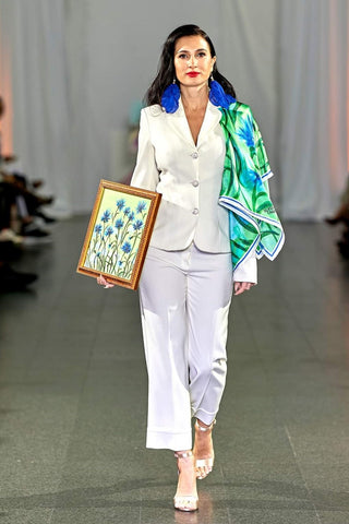Alesia Chaika Wearable Art Fall/Winter 2022 at the Museum Of Conterporary Art Chicago on October 10th, 2022 White pant Suite, Alesia C. Cornflower Silk Scarf, Silk Earrings