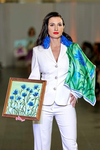 Alesia Chaika Wearable Art Fall/Winter 2022 at the Museum Of Conterporary Art Chicago on October 10th, 2022 White pant Suite, Alesia C. Cornflower Silk Scarf, Silk Earrings