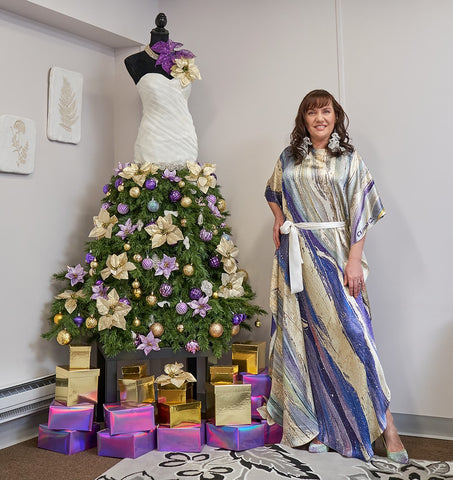 Artist and fashion designer Alesia Chaika presents her Couture Christmas Tree Dress