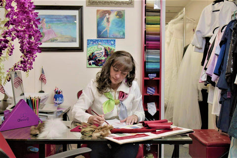 Fashion designer Alesia Chaika creating Santa costume at her flagship boutique atelier