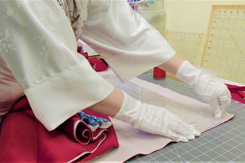 Crafting the traditional Santa Claus costume at Alesia Chaika atelier located in Buffalo Grove, Illinois USA