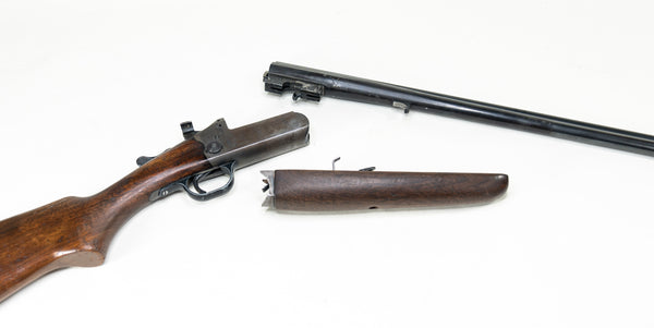 a barrel and forend removed from a rifle