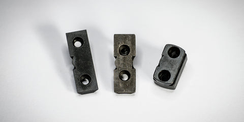 The blocks that attach scope rings to the rifle - in different lengths and heights