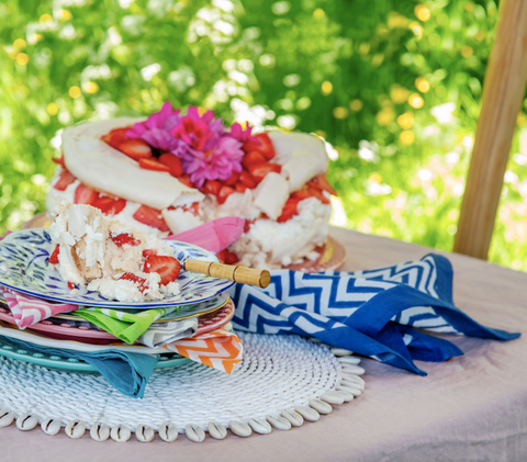 Pavlova with colourful zig zag napkins