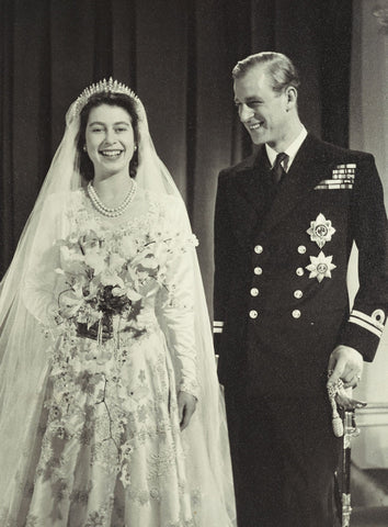 The Queen on her wedding day with Prince Phillip