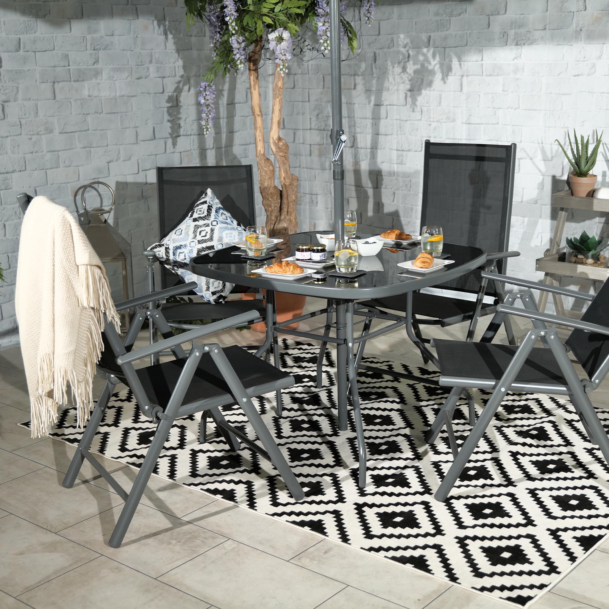 rio dining table and 4 chairs