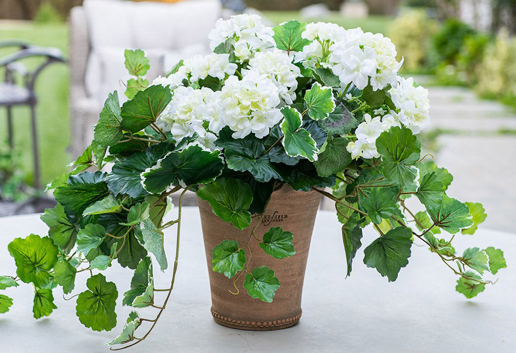 How To Fill An Outdoor Planter With Artificial Flowers